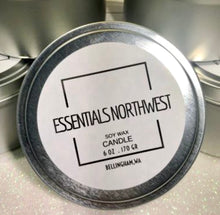 Load image into Gallery viewer, 6oz round metal tin candle with lid on sparkly background