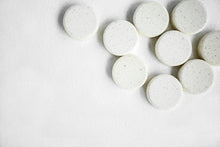 Load image into Gallery viewer, White round shower steamer plucks on white background