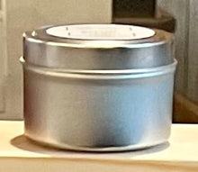 Load image into Gallery viewer, Round metal candle tin with lid on black  white wood with white background
